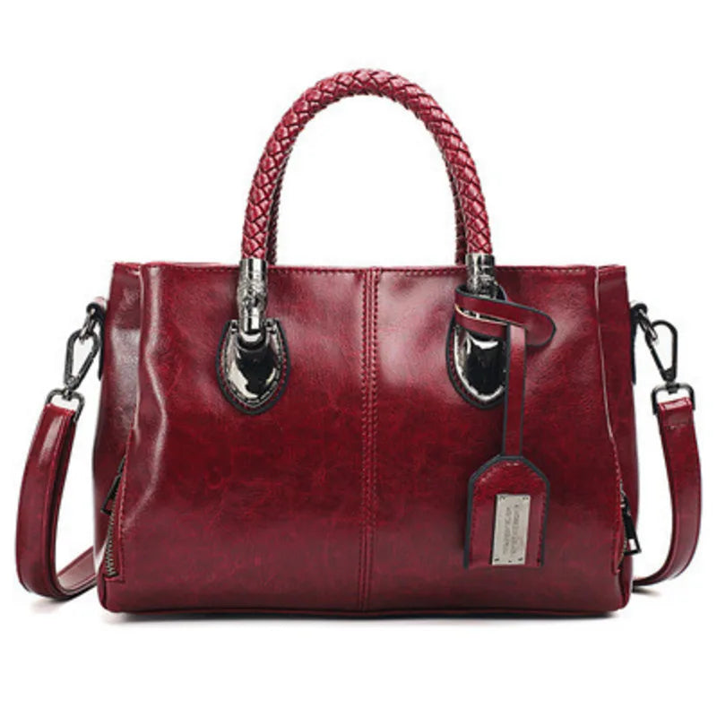 Pia™ | Elegant leather bag with braided handles